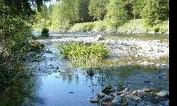 Lovely wooded lot sitting on the Snoqualmie River w/ Mt Si in the background. Quiet private drive minutes from I-90. Buffer from river delineated and perc test complete. Public water & power in the Street. Building site sits high above the river w/ gentle