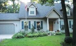 Nestled in the woods, this spacious 4 BR 3.5 bath home is situated on a beautiful, secluded double wooded lot at Lake Wildwood, a private gated lake community less than 2 hrs from Chicago. Main floor Master BR, bath and laundry. 3 walk in closets,