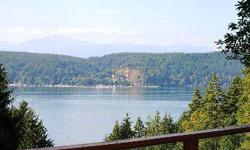 Awe-Inspiring Hood Canal and Olympic Mountain views coupled with total privacy & countless upgrades! This 1200 SF 2 bedroom home boasts Knotty Pine clad walls, granite counters, vaulted ceilings, slate flooring, & propane F/A furnace. Enjoy this top of