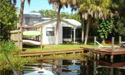 Fabulous two story bungalow with private boat ramp & dock on the Braden River. Beautiful granite counters, wood cabinetry, stainless appliances, mexican tile floors throughout. Two bedrooms and study room on 2nd floor. Two bedrooms on ground including