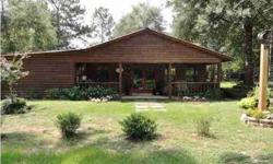 Country style home on 5 country acres. Who could ask for more! Deep front porch welcomes you home to this 3 bedroom, 2 bath charmer. Fireplace in great room, master BR has sitting area with large entertainment center. Homesite is handy to Blackwater State