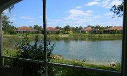 Gorgeous 1st floor lakefront coach home in Pelican Preserve. This unit is the popular Corsica floor plan with 1836 sq/ft living area, 3 bedrooms and 2 baths. A spacious lanai overlooking the lake and a private 2 car garage. Upgrades include oversized tile
