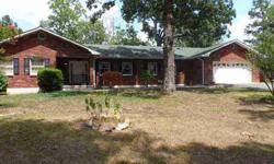 Home for sale in Ellsinore, MO - Carter County - Very well maintained 3 bedroom, 3 bath home with full unfinished walk-out basement. Electric fireplace in oversized living room. Attached garage with additional covered back porch that overlooks private