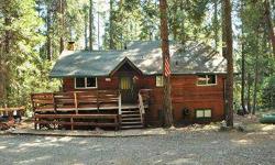 Mountain living at its Best! Remodeled 1800 s.f. home on a level Â½ acre located within walking distance to Scotts Flat Lake. New windows, carpet, decks and lots of charm! Day to day living on the main floor includes open floor plan of living room with