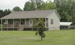 Nice country home in great community - 3 BR, 2 Full Baths, sunroom, living room, kitchen. Nice Metal out-building. Property has 28.9 acres with pasture and woods.Listing originally posted at http