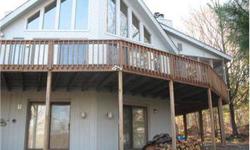 Prow front Chalet in excellent condition. Winter Lake views of Roamingwood Lake.
Listing originally posted at http