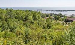 Spectacular vistas of Duluth Harbor, Park Point and Lake Superior await from this unique parcel of land situated between a city easement, below Skyline Pkwy and Superior Hiking Trail on the upper side of W. 5th St. This gradual sloping land with some rock