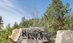 Beautiful level piece of property ready for your dream home. This stunning 10 acre parcel has well already installed. The dramatic rock cliffs rising out of the eastern side of the property provide both privacy and the opportunity for a landscape