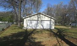 #4022-3821 ASH. Nice large 100x224 mostly fenced in lot in Hayes Twp. Not far from town with well (newer point and pump), septic system unknown, nat. gas, large finished and insulated 22x24 2 car garage in excellent shape with vinyl siding, wired with