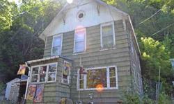 Three Bedroom, 1 bath village home in need of some TLC. Located on a dead end road.Listing originally posted at http
