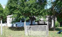 Doublewide mobile home with little value on 2.45 acs. in Cypress, FL. Good location on a paved road. Good investment property. Either renovate existing home, remove it and build a home or place another mobile home on lot.
Listing originally posted at http