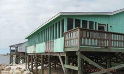 GREAT VIEW WITH SURROUND SOUND OF THE GULF OF MEXICO THAT IS. TWO BEDROOM ONE BATH HOME ON PILINGS WITH A BONUS ROOM FOR THE GUESTS. SCREENED IN PORCH OVER LOOKING THE WATER. IF YOU LIKE TO FISH AND SHRIMP THIS IS FOR YOU.
Listing originally posted at