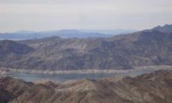 1.25 Acres in Meadview Az Panoramic views from the lot Close to main road Pierce Ferry Rd To view the lot map and GIS search for Mohave County Assessor, Property search enter APN# 336-06-413 Lot legal description