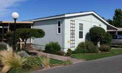 Welcome Home! Riviera Mobile Home Park has river front park for fishing and picnicking! What a beautiful place to call home. Pride of ownership, newer roof, room for garden, nicely manicured lawn, large kitchen for the cook in your family and all