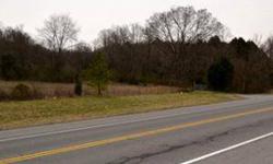 Opportunity to invest in real estate, this 26.89 acres (aprox) has many building sites with a pond and a spring creek winding thru. Listing originally posted at http