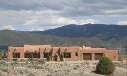 YouÃ¢??ll fall in love with all the sights from this 4 acre site sitting on a bluff bordering 100Ã¢??s of acres of Taos Pueblo land. YouÃ¢??ll love this 4,000 plus sq. ft. custom adobe home with abundant Southwest touches throughout like 5 fireplaces, vigas,