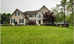 This four bedroom, three and one-half George Parry custom home is located on 2 acres of park-like land in one of the premier neighborhoods in Bucks County. This European inspired home is set on a hillside on tranquil, tree lined grounds with easy access