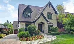 Right out of the Cotswolds! Charming stucco and brick English Cottage-style home abounds with charm & grace. Designer touches throughout. Elegant hand-painted and faux finish details by Douglas Coggeshall, Custom Joliet Cabinetry, natural stone and