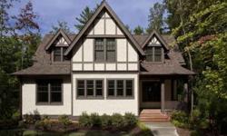 -Stunning Tudor home with meticulous detail throughout. Gracious foyer opening to a dream diningroom with builtins. Mike Design gourmet kitchen with Thermador designer appliances, Tower refrigerator/freezer, range. WOW factor! Inviting main level master