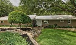 Fantastic lake house on one acre that is beautifully landscaped and covered with incredible oak trees, such a beautiful location that is cool & shady, so relaxing, many decks and patios to enjoy the 230' of open Lake LBJ waterfront. The home is open and