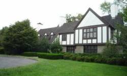 CALL NEAL DALESSIO 203-984-1118wonderful tudor home built in 1925. The 2.2 acres are flat and have mature trees surrounding it. The charm of the interior with the walnut trim, 4 stone wood burning fireplaces which gives each room warmth and charm. The