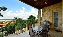 Panoramic Lake Travis and Rough Hollow Marina Views! Artisan details throughout including wrought iron rails, wood beam ceiling accents, plank hardwood floors, rich granite counters, stunning custom cabinetry, high end appliances and two story stone wall