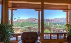 This quality built Southwestern style home has sweeping elevated red rock views of the Sedona Golf Resort, Cathedral, Castle, Bell & Courthouse Rock, Thunder & Lee Mountain and Boynton & Jacks Canyon. Walls of glass & high ceilings bring the views &