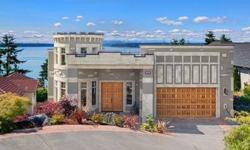 Breathtaking, finely crafted home gives the feeling of floating above the bay with its sweeping views of the Sound, Vashon Island, Lighthouse and Olympic Mts. No detail was spared in the building of this home. Epicurean kitchen offering Viking appliances,