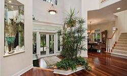 Picture yourself living surrounded by Olde Florida charm and elegance in your private serene tropical gardens on 2.5 acres in town. The main house greets you with a wrap-a-round porch inviting you to sit back and relax, and offers three bedrooms 2.5 bath
