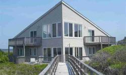 Oceanfront Caswell Beach home with breathtaking views of lighthouse, intracoastal waterway, and the beach! 3BD/3.5BA--Large master suite on the top floor with large picture windows to maximize views and master bath w/whirlpool and walk-in closet. Wrap