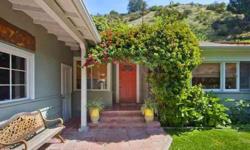 Beautiful traditional home in Franklin Canyon features 3 bedrooms and 2 baths. Fabulous layout with possibility of 2 master bedrooms. Many rooms open to the charming outdoor patio & garden. Highlights include high ceilings, skylights, hardwood floors,