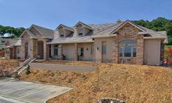 Stunning 6400 single story home. Kitchen is a gourmet dream, Viking appl. granite counters, & travertine floors. Familyroom is spacious with fireplace, vaulted ceilings, and gorgeous crown molding. Diningroom, & formal livingroom feature walnut flooring.