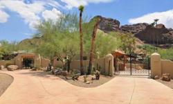 Your very private and secluded sanctuary awaits you on this acre+ lot located near the base of Camelback Mountain with dramatic and close up views of the mountain. Very tastefully recently remodeled territorial home located in one of the most popular