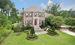 Elegance Traditional style home that is landscape and manicured to near perfection. The home boasts formal living, office, mud room, keeping room, breakfast area, gourmet kitchen with center island, recreation room, media room, luxurious master suite and