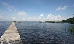152 feet. on the St. Johns River with Century Old Oaks and beautiful views. Excellent location, Zoning is PUD for four townhomes to be built; re-zone for one family home. Owner will consider trade.Listing originally posted at http