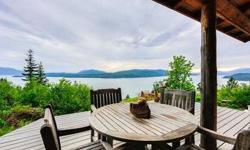 Captivating artisan style 4000 sqft home with charm & style surrounded by over 8.5 acres of pristine wildlife & North Idaho beauty! Panoramic views of Lake Pend Oreille from nearly every room. Enjoy the outdoors on 2 large decks & a patio. Spacious layout
