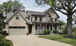 Perfect newer brick and stone home in East Glenview situated on cul-de-sac features a stone front porch. Welcoming foyer with Brazilian cherry floor divides elegant living room and formal dining room. Gourmet kitchen, with granite counter tops, high end
