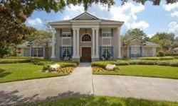 SOUTHERN CHARM AND OPULENCE with FLORIDA STYLE AND PANACHE!! SPACIOUS AND RECENTLY UPDATED, CUSTOM BUILT HOME is on the 2nd TEE of the prestigious WINDERMERE COUNTRY CLUB COURSE. CUSTOM FEATURES ABOUND; Crown molding, dramatic foyer with circular stair