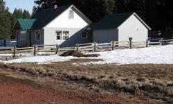 Rare high mountain ranch with a charming cabin and productive mountain meadows close to Howard Prairie and Hyatt Lake. Old water rights. Additional acreage available.Listing originally posted at http