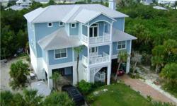 Live your dream in this beautiful custom Key West 6 bedroom 5 1/2 bath home with w/office. Boat dock with lift with direct access to the ICW. Minutes away from the Gulf to enjoy world class fishing. Walking distance to the beach to enjoy relaxing, walking