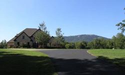 Private, country estate in blue ridge foothills with beautiful mountain view. JANICE PARKKONEN is showing this 4 bedrooms / 4 bathroom property in Landrum, SC. Call (864) 990-8033 to arrange a viewing.