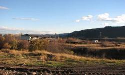 Approx. 21.562 acres adjacent to Kalispell city limits and mixed use neighborhood that has seen active development over the past five years. This prime development property is located one block from a new bypass on/off ramp. Highest and best use may be a
