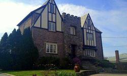 Beautiful Stone And Brick Tudor On Almost 1/3 Acre. Stunning Details, Spacious Rooms, And Beautiful Condition. Three Arched Doorways Lead To A Formal Living Room With Stone Fireplace, A Gorgeous Kitchen With Large Eating Area, And A Light Filled Vaulted