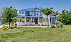 Located in Ft Myers, this grand old-Florida style home is situated on 5 acres and is 6000 square feet. There are 5 spacious bedrooms plus a den, as well as 4 and one half baths spread over two floors. There are numerous upgrades throughout, including hard