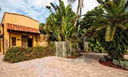 From the moment you enter the antique eight foot double entry doors into the courtyard of this custom home you will know you have arrived at a home unlike any other on Siesta Key. Leave the world behind and enjoy the water cascading from the grotto of the
