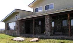 CUSTOM BUILT WOOD AND STONE HOME WITH seventeen ACRESListing originally posted at http