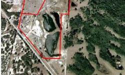 30 +- acres zoned I-2, 4 miles to airport and 1 mile to county seat. Former Sand Mine and on-going concrete, crushing and material re-cycling with 16,000 cu. yd. capacity for yard waste and mulching. 1900 ft. on major road frontage, 10 acres of water.