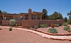 Incredible red rock views from every room of this stunning Southwest home in prestigious North Slopes. The 2+ acres of landscaping surrounding the home are park-like with gravel paths through the trees. A beautiful salt-water pool with waterfall and spa,