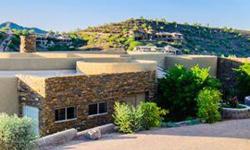 FABULOUS FIREROCK. Contemporary Jewel tucked into a hillside retreat. Quality is immediately evident when you enter the custom pivoting frontdoor. A telescoping wall of windows greets you at the entry & thrills with spectacular golf course & mountain
