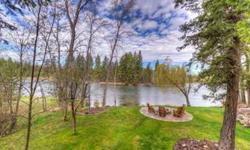 A magnificent lush setting complement this exclusive 4129 sq ft home on Swan River. Endowed with the pleasures of a riverside lifestyle the 3 bedroom, 4 bath homes rests on 1.38 acres and 132 ft of frontage with access to Swan Lake. A media room, game